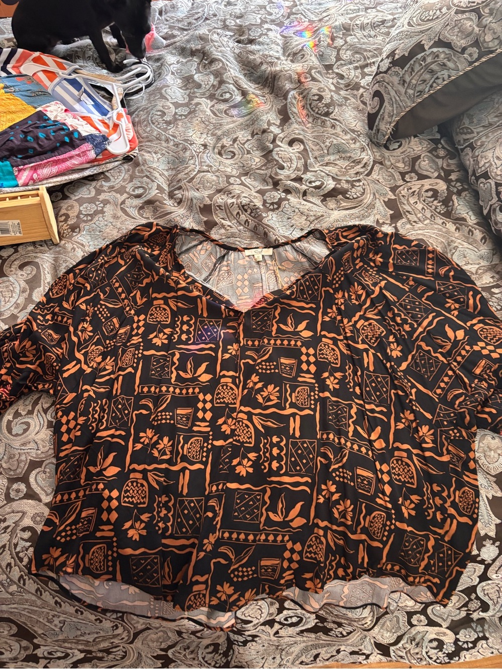 easel Black Blouse with Rust Orange Geometric Print
